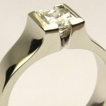 e7597. 1 princess cut solitaire