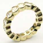 e8901.1 scalloped edge channel set eternity ring