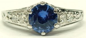 e9552 18kt. Ceylon sapphire and diamond ring