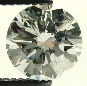 chipped diamond e9594 0.88ct. before repair