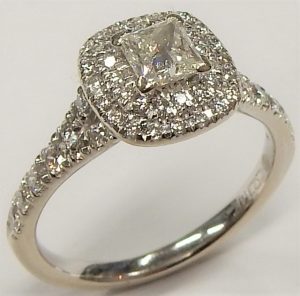 1.07 cttw. Oval Diamond Ring with Small Trio Side Diamonds Size 5.5