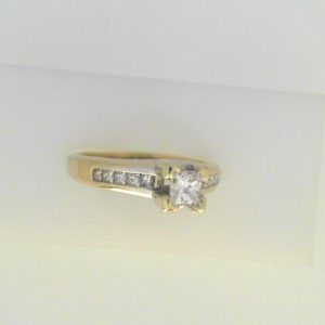 Diamond Engagement Ring 
14 Karat White Engagement Ring 0.57twt
Finger Size 6 Gram Weight 4.38gram weight 
1 Center Diamond 0.32ct Shape: Princess Clarity: VS2 Colour: G With 10 Various Shapes Diamonds 0.25 ctw 0.57