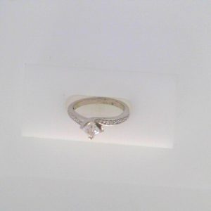 Diamond Engagement Ring 
14 Karat White Engagement Ring 0.57twt
Finger Size 6.5 
 Center Diamond Shape: Princess Clarity: I1 Colour: H Round Diamond 0.15 ctw 0.57