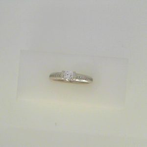 Diamond Engagement Ring 
14 Karat White Engagement Ring 0.45twt
Finger Size 6.25 Gram Weight 4.1gram weight Width: 2.5 
1 Center Diamond 0.30ct Shape: Round Clarity: SI2 Colour: G SEE CERT With 30 Round Diamonds 0.15 ctw 0.45