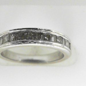 Estate Diamond Anniversary Ring 
14 Karat White Estate Anniversary Ring 
Finger Size 5.25 Gram Weight 3.2 
13 Center Diamonds Shape: Various Shapes; Clarity: SI; Colour: I 0.5