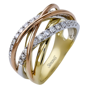 Diamond Dinner Ring - Women's 
18 Karat Rose/White/Yellow Dinner Ring 
Finger Size 7 
 Center Diamond Shape: Round Clarity: VS1 Colour: F/G 0.52