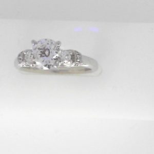 Diamond Semi-Mount Ring 
14 Karat White Ring Width 1.99mm 
Finger Size 6.5 
26 Center Diamonds Shape: Round 0.38