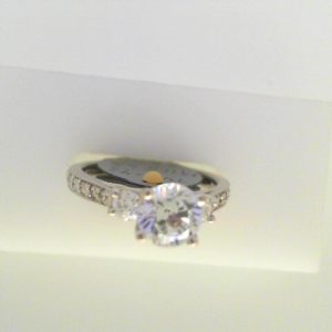 Diamond Semi-Mount Ring 
14 Karat White Ring 
Finger Size 6.25 
1 Center Cubic Zirconium 1.00ct Shape: Round Round Diamond 0.43 ctw 1.43
