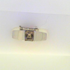 ** Ring 
14 Karat White ** Ring With Finger Size 6.5 
Width 2.5mm Gram Weight 3.45 
1 Center ** Shape: Princess