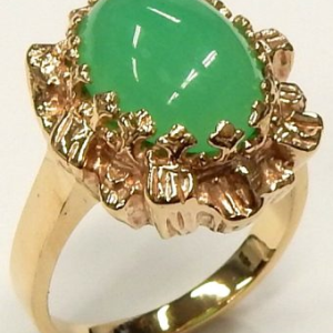 Chrysoparse Estate Ring 
14 Karat Yellow Chrysoparse Ring With Finger Size 7 
 Gram Weight 7.6 
1 Center Chrysoparse Shape: Cabochon