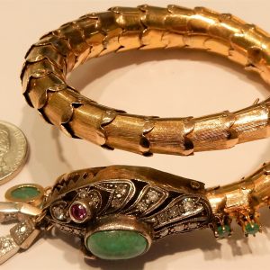 Estate Bracelet With Diamonds 
14 Karat Yellow H/I Diamonds Bracelet 
Gram Weight 51.3 
30 Center Diamonds Shape: Radiant; Clarity: SI-I1; Colour: H/I With 1 Cabochon Emerald 3.00 ctw and 1 Cabochon Emerald 1.00 ctw and 3 Round Chrysoparses and 2 Round