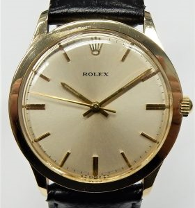 14 karat gold Rolex automatic presentation watch #46685 35mm 25 jewel calibre 1520 on strap.