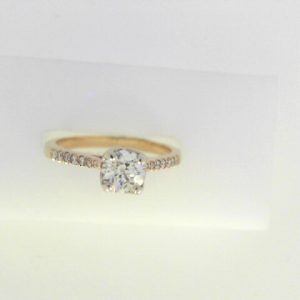 Diamond Engagement Ring
14 Karat Yellow Engagement Ring 0.64twt
Finger Size 6.25
12 Center Diamonds Shape: Round Clarity: SI1 Colour: G/H With 1 Round Diamond 0.54 ctw 0.64