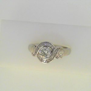 Diamond Engagement Ring
14 Karat White Engagement Ring 0.51twt
Finger Size 6.5
1 Center Diamond 0.41ct Shape: Round Clarity: I1 Colour: H With 20 Round Diamonds 0.10 ctw 0.51