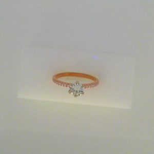 Diamond Engagement Ring
14 Karat Rose/White Engagement Ring 0.62twt
Finger Size 6.5
1 Center Diamond 0.52ct Shape: Round Clarity: VS2 Colour: I/J Round Diamond 0.10 ctw 0.62