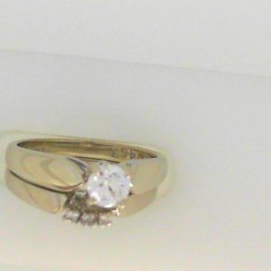 Diamond Engagement Ring 
14 Karat White Engagement Ring 0.31twt
Finger Size 5.25 Gram Weight 2.7gram weight 
 Center Diamond Shape: Round Clarity: VS1 Colour: E 0.31