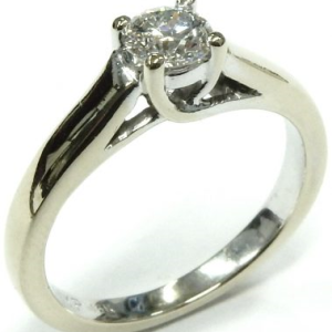 Estate Diamond Engagement Ring
18 Karat White Estate Engagement Ring Width 2mm
Finger Size 5.5 Gram Weight 4
1 Center Canadian Diamond 0.38ct Shape: Round; Clarity: SI1; Colour: G 0.38