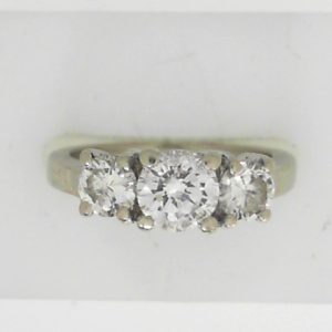 Estate Diamond Engagement Ring 
14 Karat White Estate Engagement Ring 
Finger Size 6 Gram Weight 4.6 
1 Center Diamond 0.70ct Shape: Round; Clarity: I1; Colour: H With 2 Round Diamonds 0.60 ctw 1.3