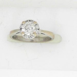 Estate Diamond Engagement Ring 
14 Karat White Estate Engagement Ring 
Finger Size 3.75 Gram Weight 2.1 
9 Center Diamonds Shape: Round; Clarity: I1; Colour: I 0.38