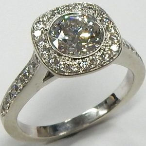 Lady's White 14 Karat Halo Estate Engagement Ring Size 7 one 0.87ct Round F/G SI1 Diamond
36 0.38tw Round G/H VS-SI Diamonds Discount: 40
Gram Weight: 4.1