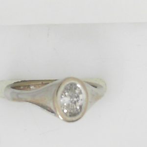Estate Diamond Engagement Ring 
14 Karat White Estate Engagement Ring 
Finger Size 4.5 Gram Weight 3.4 
1 Center Diamond 0.33ct Shape: Oval; Clarity: SI1; Colour: G/H 0.33