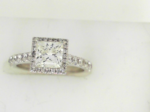 Estate Diamond Engagement Ring
14 Karat White Estate Engagement Ring
Finger Size 4.75 Gram Weight 2.79
1 Center Diamond 0.95ct Shape: Princess; Clarity: VS; Colour: K/L With 14 Round Diamonds 0.36 ctw and 24 Round Diamonds 0.06 ctw 1.37