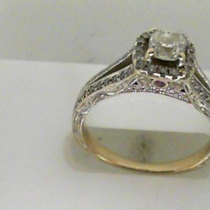 Estate Diamond Engagement Ring
14 Karat White Estate Engagement Ring Width 3.5mm
Finger Size 7 Gram Weight 4.5
1 Center Diamond 0.50ct Shape: Cushion; Clarity: SI2; Colour: I With 2 Round Sapphires 0.05 ctw and 110 Round Diamonds 0.75 ctw 1.3