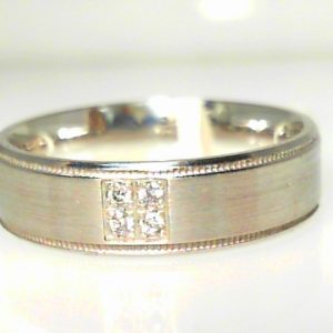 Diamond Ring- Men's 
10 Karat White Men's Diamond Ring 
Finger Size 10 Gram Weight 7 
4 Center Diamonds Shape: Round 0.06