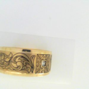 Diamond Ring- Men's 
10 Karat Yellow Men's Diamond Ring 
Finger Size 10 Gram Weight 11.65 
1 Center Diamond Shape: Princess