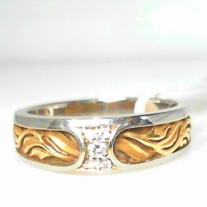 Diamond Ring- Men's 
14 Karat Yellow/White Men's Diamond Ring 
Finger Size 10 Gram Weight 7.19 
 Center Diamond Shape: Round 0.057