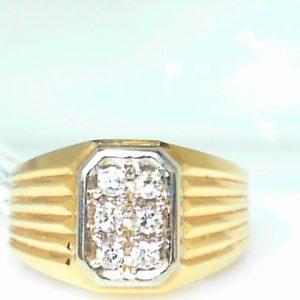 Diamond Ring- Men's 
14 Karat Yellow/White Men's Diamond Ring 
Finger Size 10 Gram Weight 10.05 
6 Center Diamonds Shape: Round 0.24