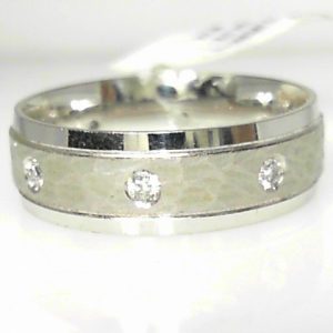 Diamond Ring- Men's 
10 Karat White Men's Diamond Ring 
Finger Size 10 Gram Weight 6.76 
 Center Diamond Shape: Round