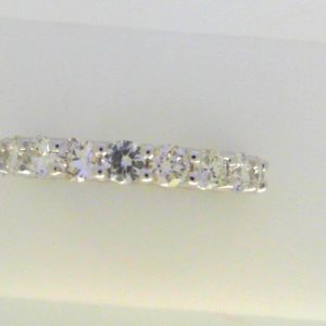 Diamond Wedding/Anniversary Ring
18 Karat White Wedding/Anniversary Ring Width 0.11mm
Finger Size 6 Gram Weight 3.3
20 Center Diamonds Shape: Round; Clarity: SI1; Colour: I/J 1.9