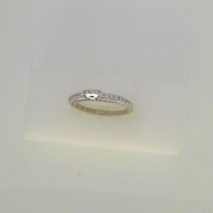 Diamond Wedding/Anniversary Ring 
18 Karat White Wedding/Anniversary Ring 
Finger Size 6.5 
 Center Diamond Shape: Round 0.2
