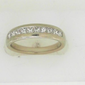 Estate Diamond Anniversary Ring 
14 Karat White Estate Anniversary Ring Width 4.6mm 
Finger Size 6 Gram Weight 4 
10 Center Diamonds Shape: Princess; Clarity: SI; Colour: I 0.75