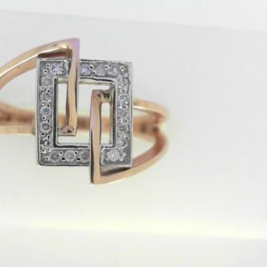 Diamond Dinner Ring - Women's
10 Karat Rose/White Dinner Ring
Finger Size 6
20 Center Diamonds Shape: Round 0.12
