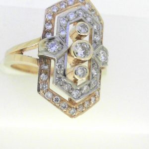 Diamond Dinner Ring - Women's
14 Karat Yellow/White Dinner Ring
Finger Size 6.5 Gram Weight 5.36
45 Center Diamonds Shape: Round 0.62