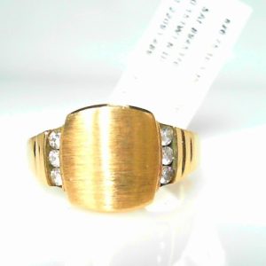 Diamond Dinner Ring - Women's 
10 Karat Yellow Dinner Ring 
Finger Size 6.75 Gram Weight 5.51 
 Center Diamond Shape: Round 0.15