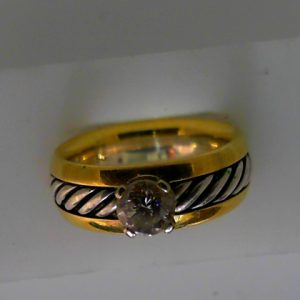 Estate Diamond Dinner Ring - Women's
18K/925 Yellow/White Estate Dinner Ring
Finger Size 7 Gram Weight 13.3
1 Center Diamond; 0.57ct Shape: Round; Clarity: SI1; Colour: I 0.57