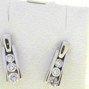 Diamond Earrings
14 Karat White Diamond Earrings
6 Center Diamonds Shape: Round 0.5
