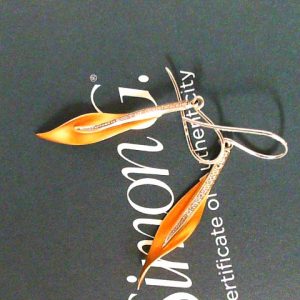 Simon G Estate Diamond Earrings
18 Karat Rose/White Estate Diamond Earrings
26 Center Diamonds Shape: Round