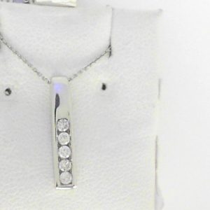 Diamond Pendant/Necklace 
14 Karat White Diamond Pendant 
Gram Weight 2.13 Chain Style: Cable Link 14 Karat White Length: 18in 
5 Center Diamonds Shape: Round 0.15