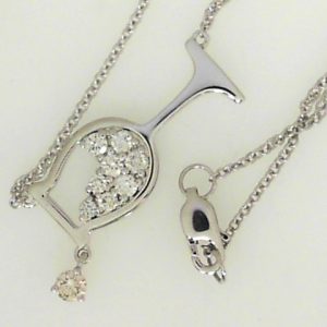 Diamond Pendant/Necklace 
14 Karat White Diamond Pendant 
Gram Weight 3.52 Chain Style: Cable Link 14 Karat White Length: 18in 
9 Center Diamonds Shape: Round; Clarity: SI; Colour: I 0.43