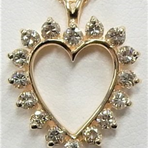 Estate Diamond Pendant/Necklace
14 Karat Yellow Estate Diamond Pendant
Gram Weight 2.9 Chain Style: Curb 14 Karat Yellow 18
16 Center Diamonds Shape: Radiant; Clarity: SI1; Colour: I/J 0.75