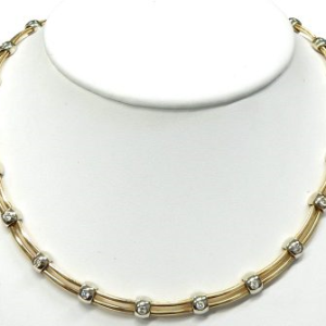 Estate Diamond Pendant/Necklace
18 Karat Yellow/White Estate Diamond Pendant
Gram Weight 53.4 Chain Style: Fancy Link 18 Karat Yellow/White 17
22 Center Diamonds Shape: Round; Clarity: SI-I1; Colour: I 2