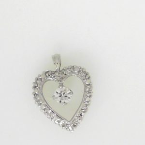 Estate Diamond Pendant/Necklace
14 Karat White Estate Diamond Pendant
Gram Weight 1.78 Chain Style: No Chain
11 Center Diamonds Shape: Round; Clarity: I1; Colour: I 0.25