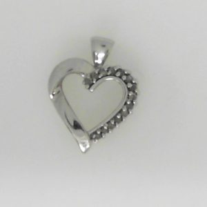 Estate Diamond Pendant/Necklace 
10 Karat White Estate Diamond Pendant 
Gram Weight 1.7 Chain Style: No Chain 
14 Center Diamonds Shape: Round 0.07