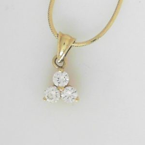 Estate Diamond Pendant/Necklace
18 Karat Yellow Estate Diamond Pendant
Gram Weight 5.8 Chain Style: Snake 18 Karat Yellow 16
3 Center Diamonds Shape: Round 0.5