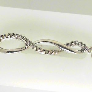 Estate Diamond Pendant/Necklace 
10 Karat White Estate Diamond Pendant 
Gram Weight 1.31