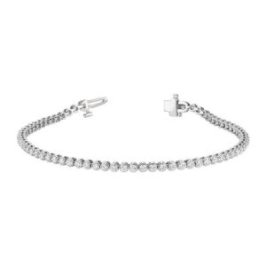 Diamond Bracelets 
14 Karat White Diamond Bracelet Length: 7in 
Gram Weight 6.32 
 Center Diamond Shape: Round 2